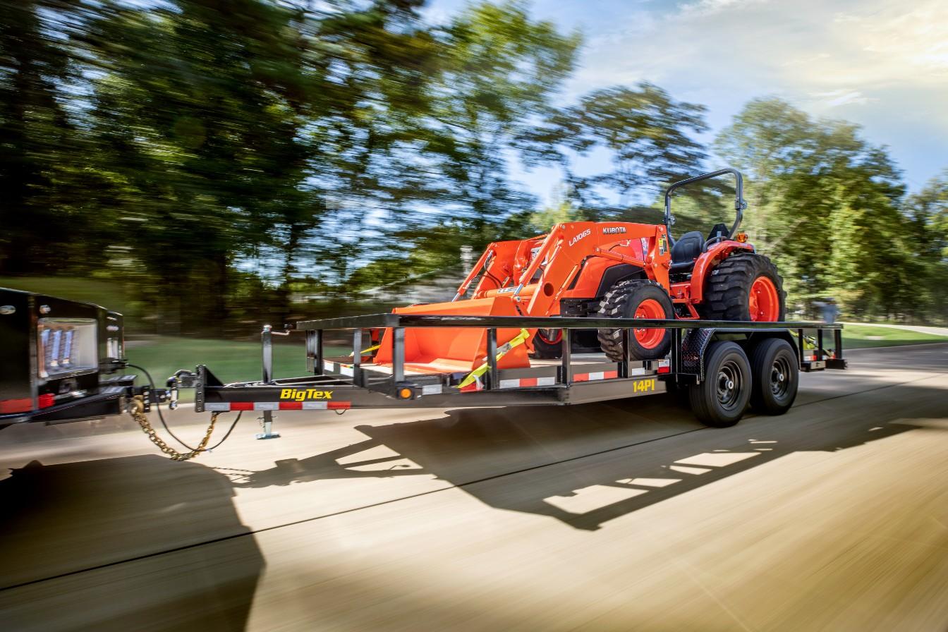 2024 Big Tex Heavy Duty Tandem Axle Pipe Top Utility Trailer 83”x 20’ w/ 4’ slide out ramps, spare tire mount, and dual brake axles. image 2