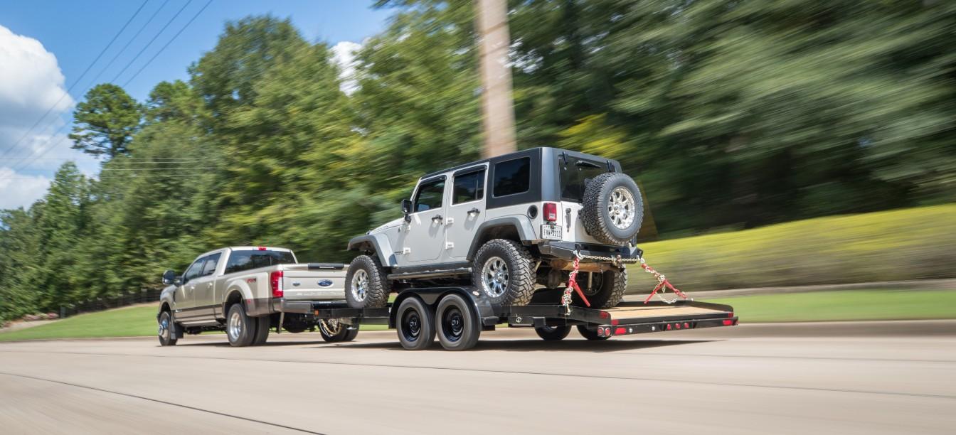 2022 Big Tex Tandem Axle Car Hauler 83”x 18’ w/ 4’ slide out ramps, spare tire mount, brakes. image 6