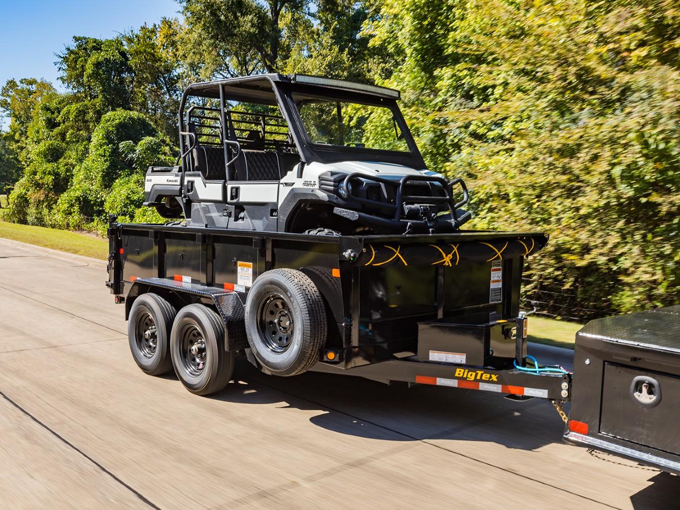 2024 Big Tex Pro Series Tandem Axle Single Ram Dump Trailer 83”x 12” w/ combo gate, spare tire mount, 6’ slide in ramps.  BLACK image 4