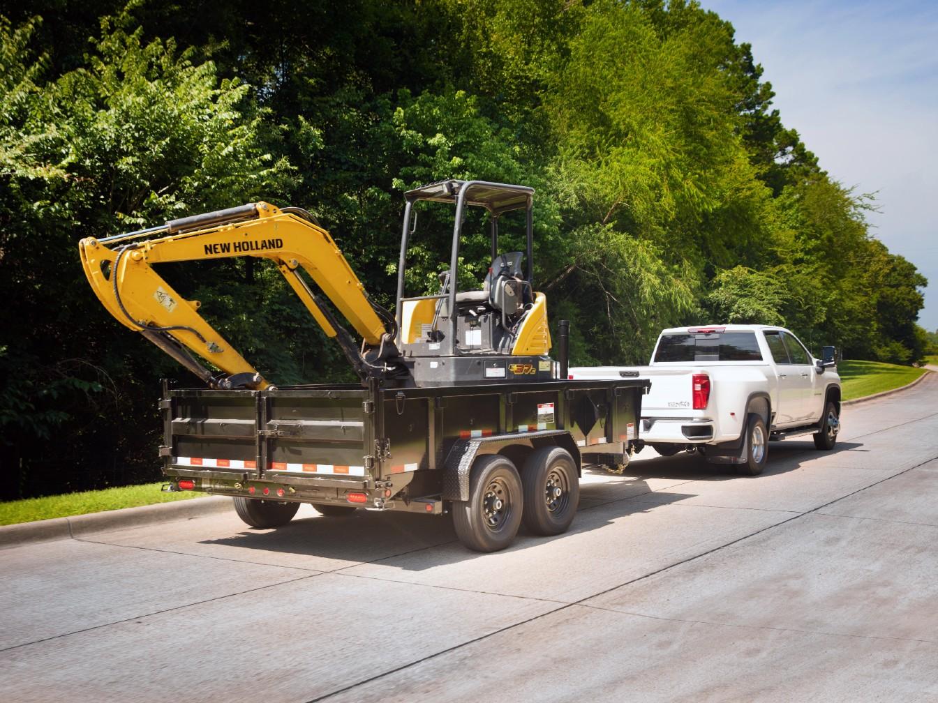 2024 Big Tex Heavy Duty Telescopic Dump Trailer 83”x 14’ w/ combo gate, spare tire mount, 6’ slide in ramps, tarp kit.  Black image 6