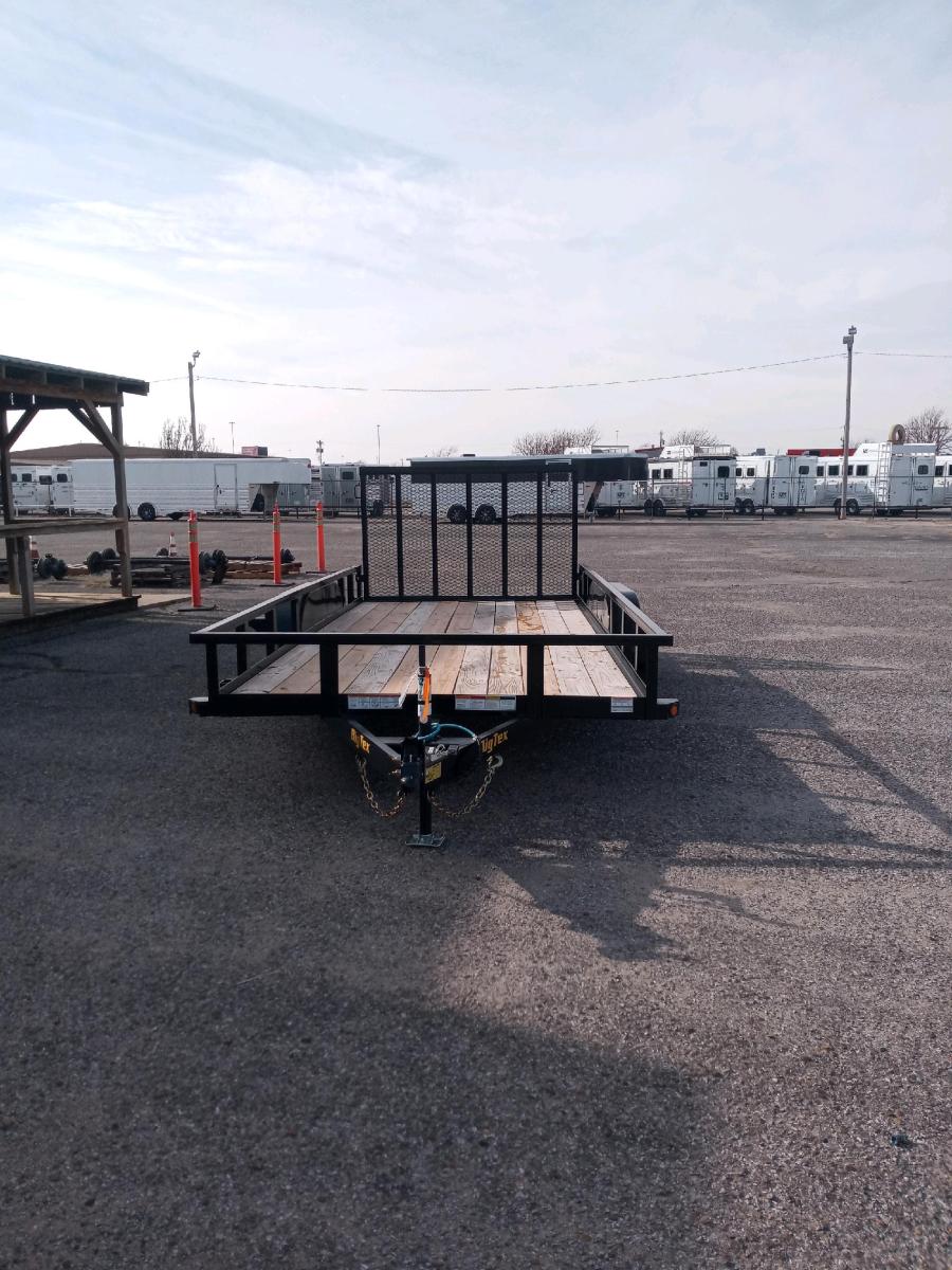 2023 Big Tex Tandem Axle Extra Wide Pipe Top Utility Trailer 83”x 20’ w/ a dual spring assisted gate, spare tire mount, brakes. image 1
