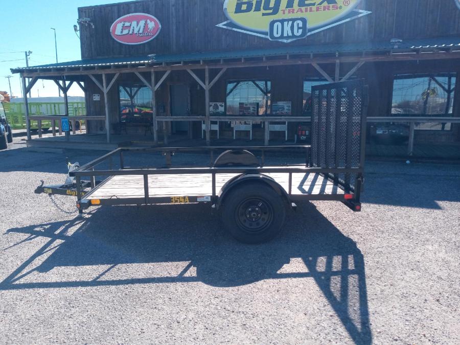 2023 Big Tex Single Axle Pipe Top Utility Trailer 77”x10’ w/ a 4’ dual spring assisted ramp gate, spare tire mount. image 1