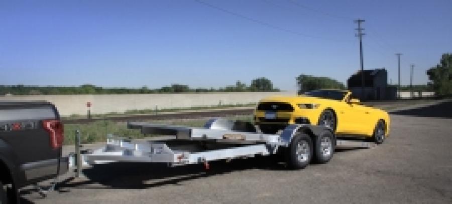 Aluma 8220 Aluma 82″ x 20 Tilt TA Utility Trailer, 4800# Axles image 0