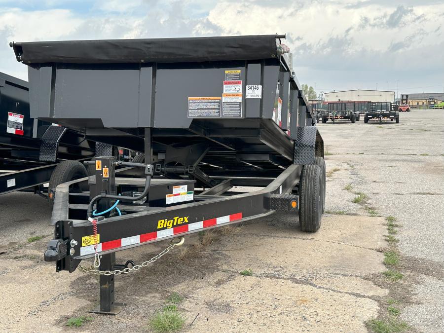 2024 Big Tex 14LP Heavy Duty Ultra Low Profile Dump Trailer 83”x 14’ w/ combo gate, spare tire mount, 6’ slide in ramps, tarp kit.  Black image 0