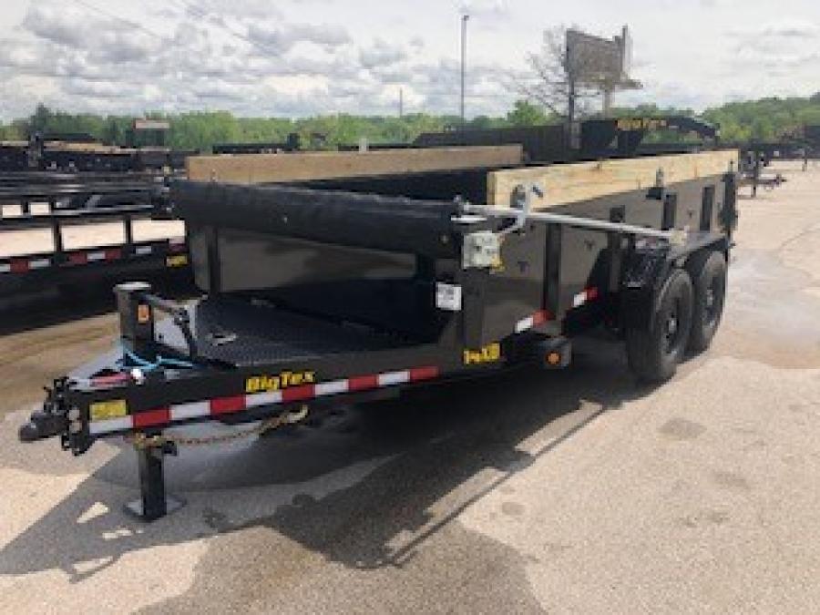 2025 Big Tex 14XD – Heavy Duty Low Profile Dump Trailer 83”x 14’ w/ combo gate, spare tire mount, 6’ slide in ramps, spring-loaded swing arm tarp, 14-ply tires – Black image 0