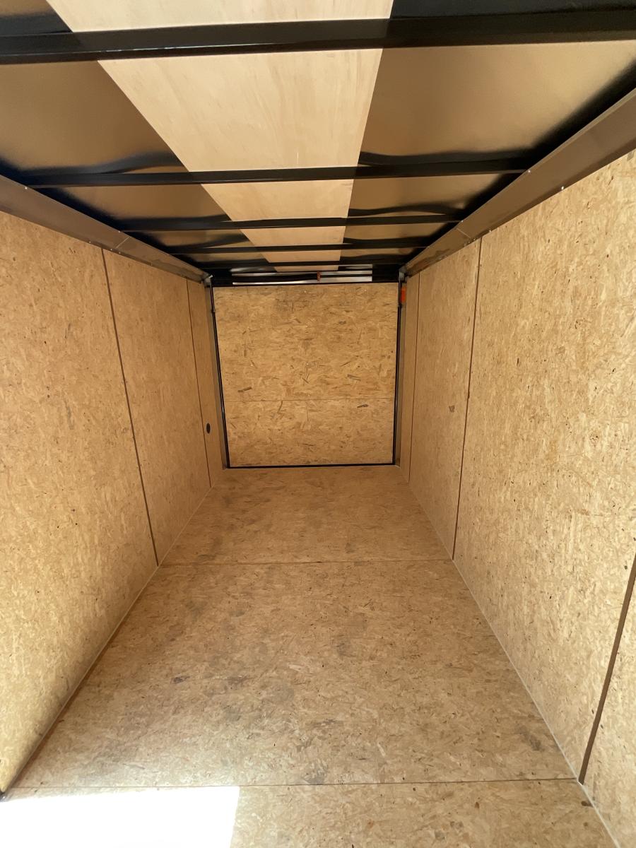 K102 85X24 INDIGO DLX FLAT TOP VNOS ENCLOSED CAR HAULER Image 1