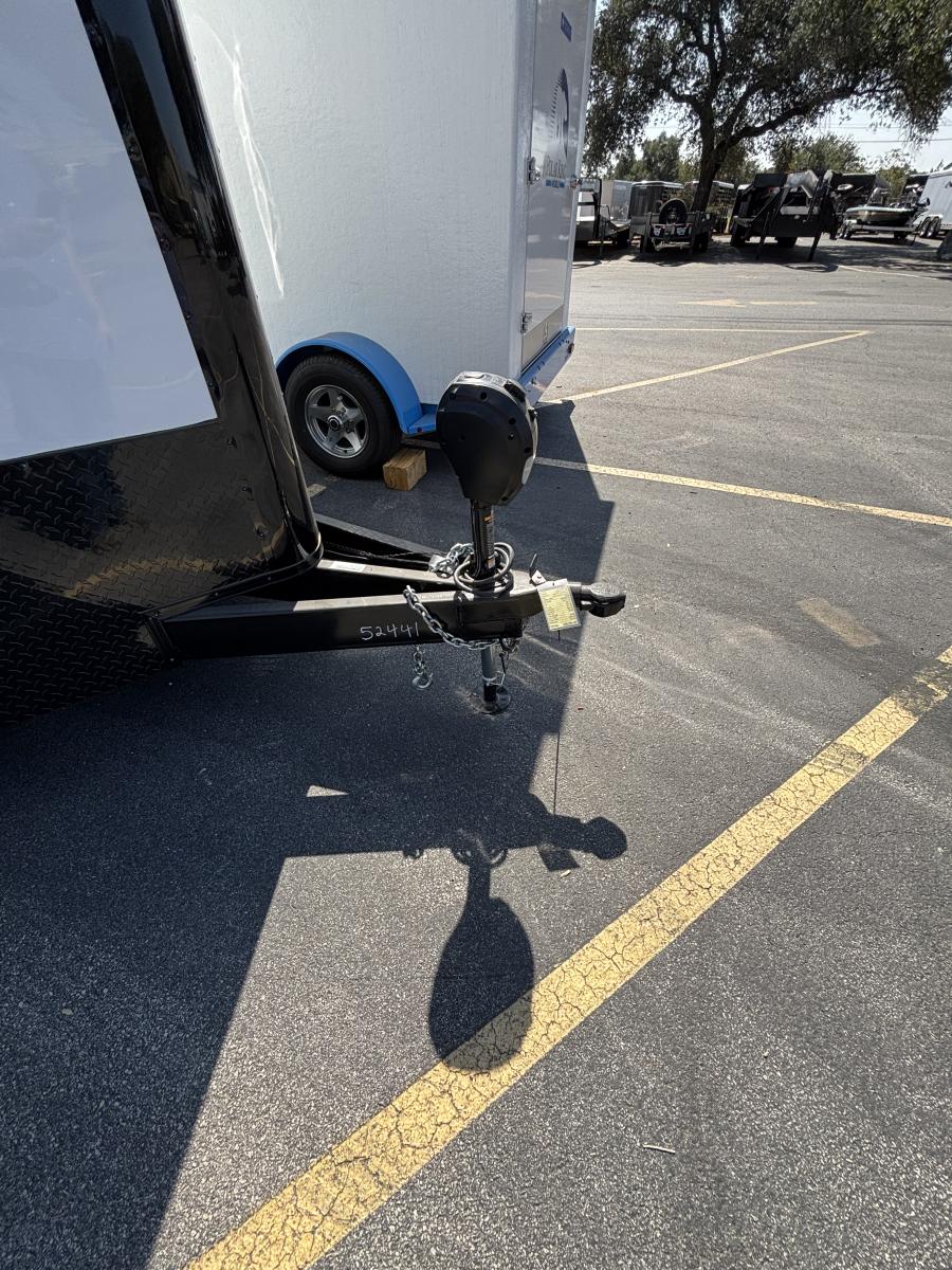 8.5×20 tandem axle enclosed cargo trailer with tons on extra’s Image 1