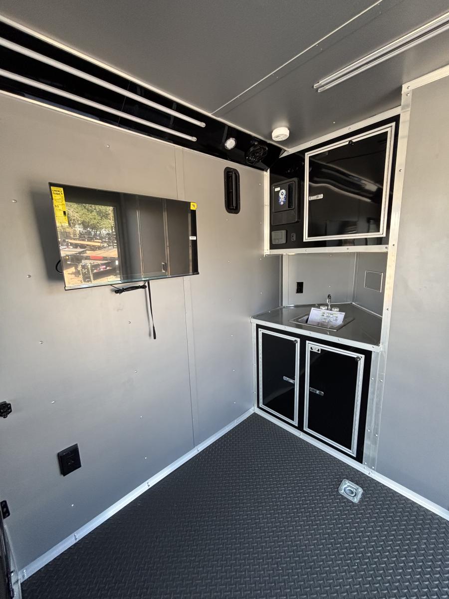 8.5x20 tandem axle enclosed cargo trailer with tons on extra's Image 13