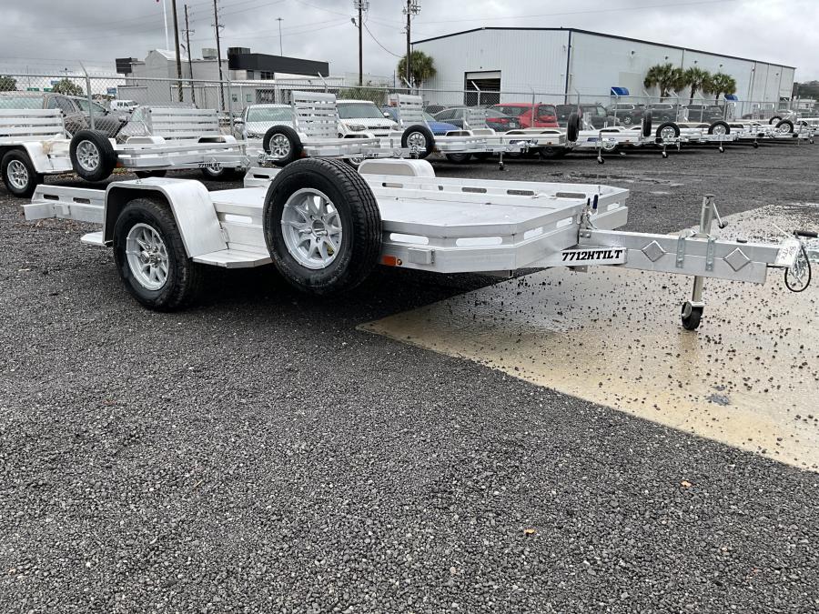 Aluma 7712 Aluma 77" x 142" TA Utility Trailer 3000# Axles Tilt Bed Image 0